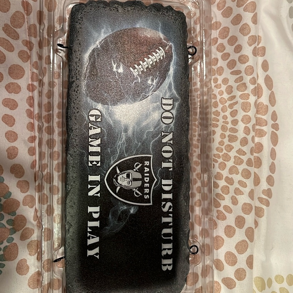 Raiders do not disturb sign